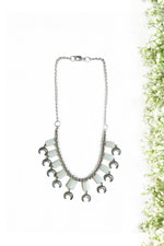 White With Charms Dangling